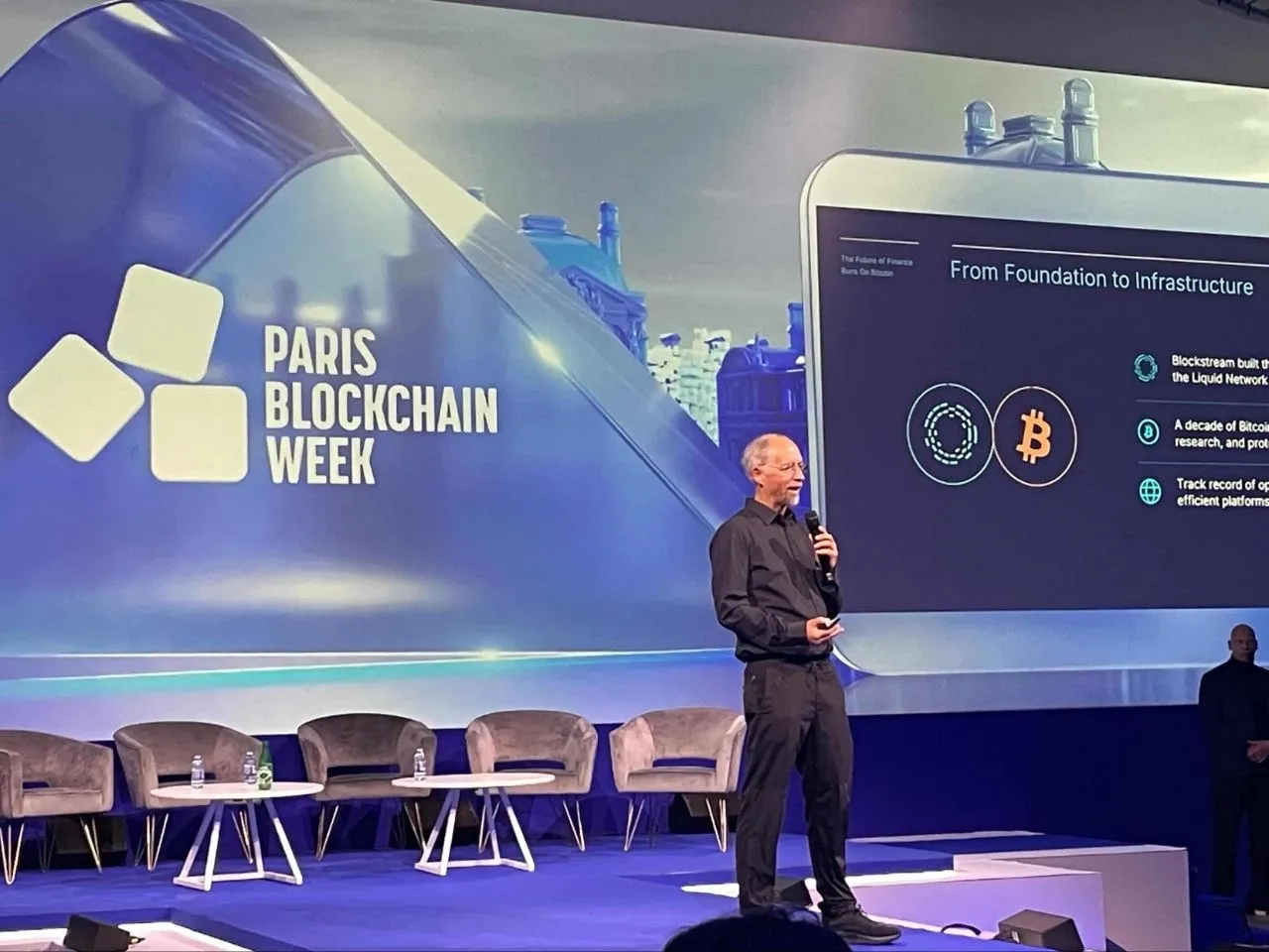 Adam Back speaking at Blockchain Paris Week